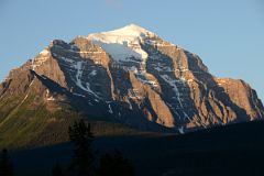 08 The Light Of Sunrise Quickly Changes To White On Mount Temple From Lake Louise Village.jpg